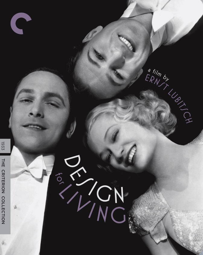 Criterion collection movie cover for "Design for Living" a film by Ernst Lubitsch. Fredric March, Gary Cooper, and Miriam Hopkins lie on the floor, smiling up at the camera, wearing formal clothes. The men are in tuxes with white ties, Miriam Hopkins in a white sparkly dress. The photo is black and white. Their heads are together as they lie facing different directions.