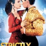 Poster for movie "Strictly Ballroom" - woman with dark brown hair in shiny red dance dress is in ballroom dance embrace with a man with dark hair in a shiny yellow bolero jacket and black pants.